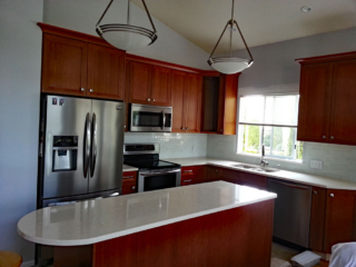Kitchen renovation brown and white kitchen, designed and renovated by Grecam Contracting