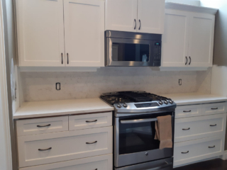 Kitchen renovation white cabinets and countertops, kitchen renovation by Grecam Contracting Langley